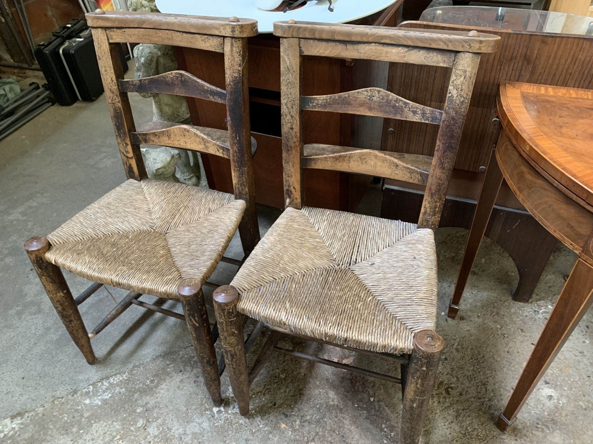 Two pine Chapel chairs with a rear shelf