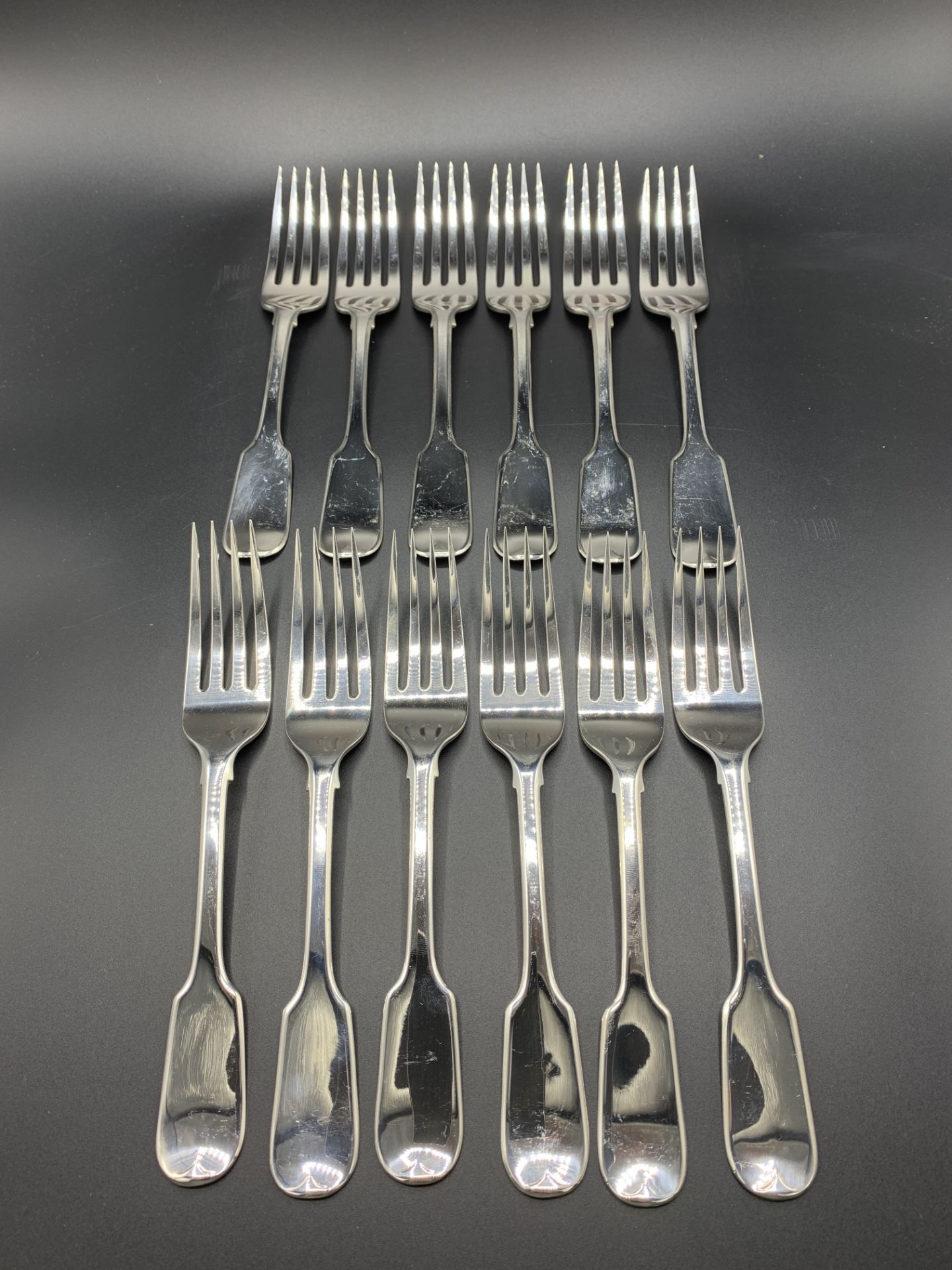 Twelve Victorian silver fiddle pattern forks, London 1845 by Samuel Hayne and Dudley Cater