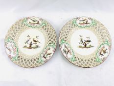 Pair of Meissen style hand painted porcelain plates with pierced rims