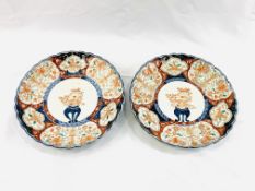 Two 19th Century Imari plates with scalloped edges and floral decoration