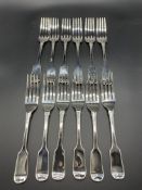 Twelve Victorian silver fiddle pattern dessert forks, London 1842 by Samuel Hayne and Dudley Cater