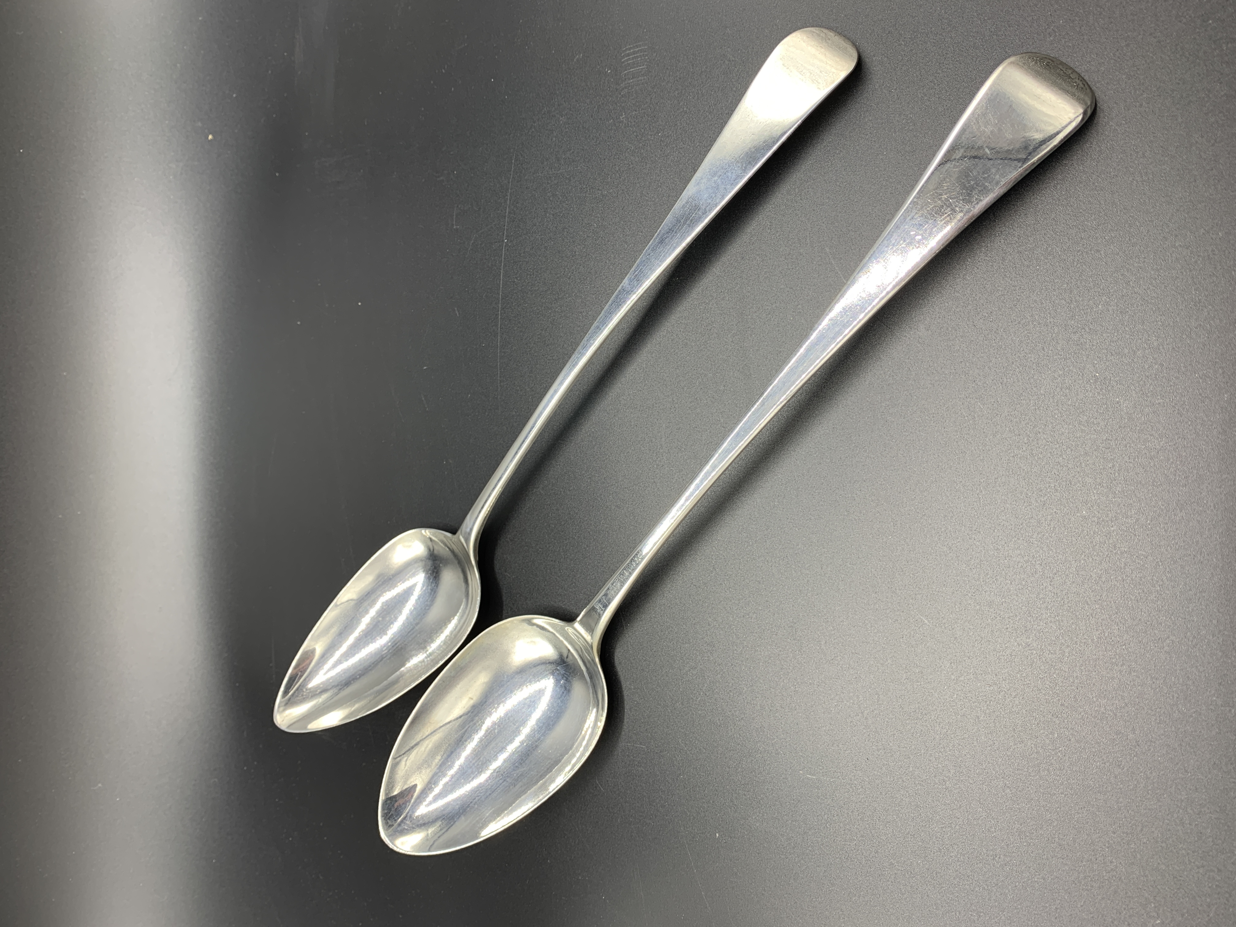 Two Georgian silver serving spoons