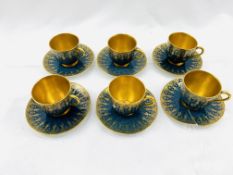 Six early 20th Century Royal Worcester coffee cups and saucers