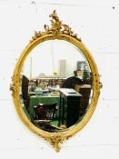 Oval gilt decorative frame bevelled edge wall mirror