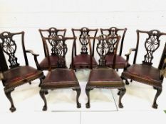 Seven Victorian gothic mahogany dining chairs