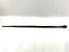 Ebony walking stick with carved head handle, and barley twist decoration