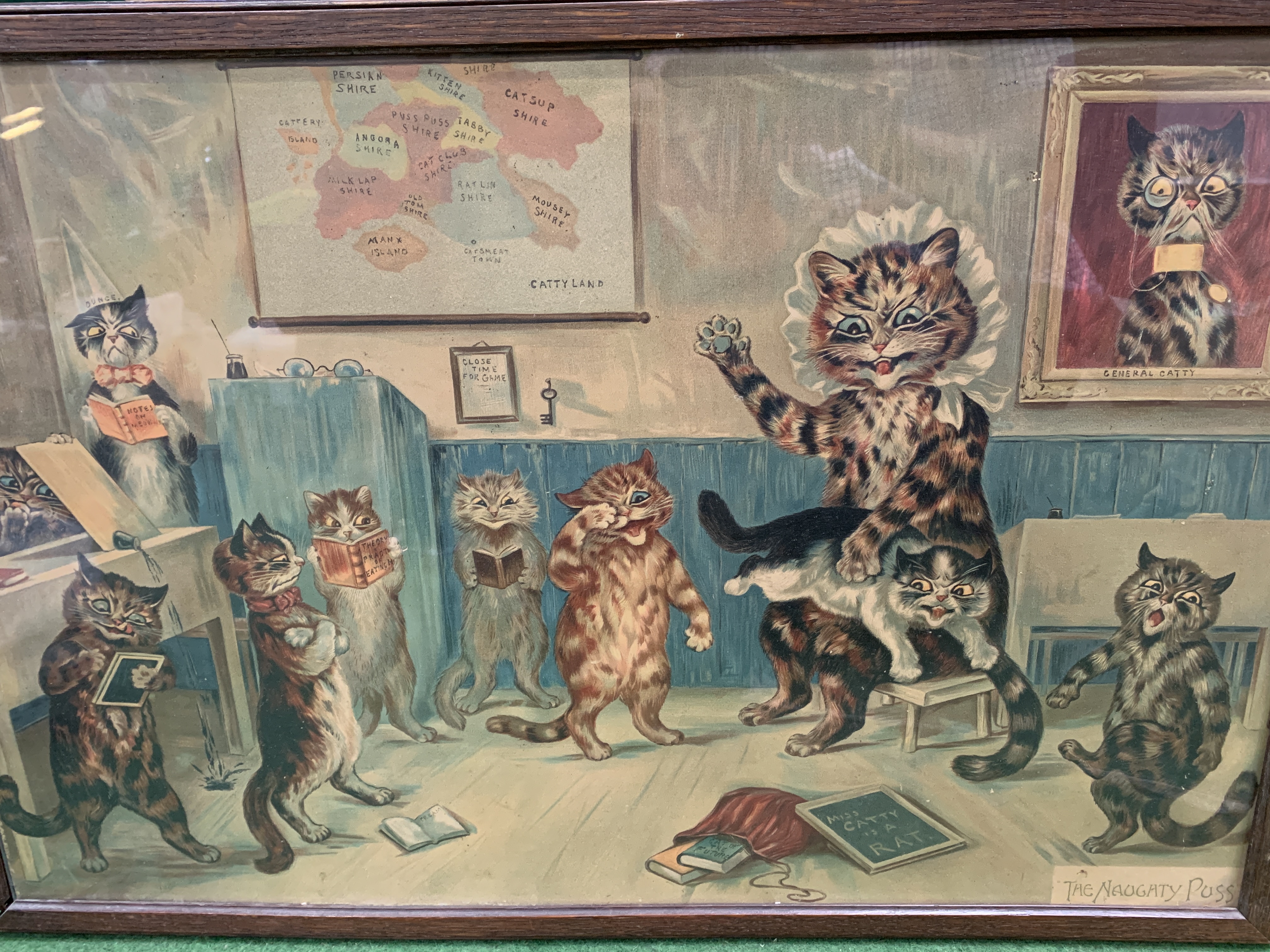 Framed and glazed Louis Wain print "The Naughty Puss"