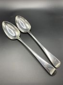 Two Georgian silver serving spoons