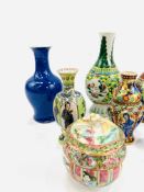 A collection of Oriental vases together with a Canton style lidded pot