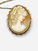 9ct gold framed cameo brooch/pendant and an 18ct gold chain