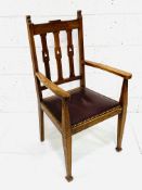 Arts and Crafts oak framed rail back open armchair