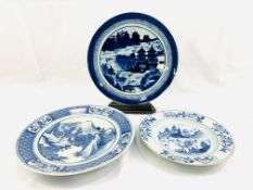 19th Century Oriental blue and white charger with two other Oriental blue and white plates