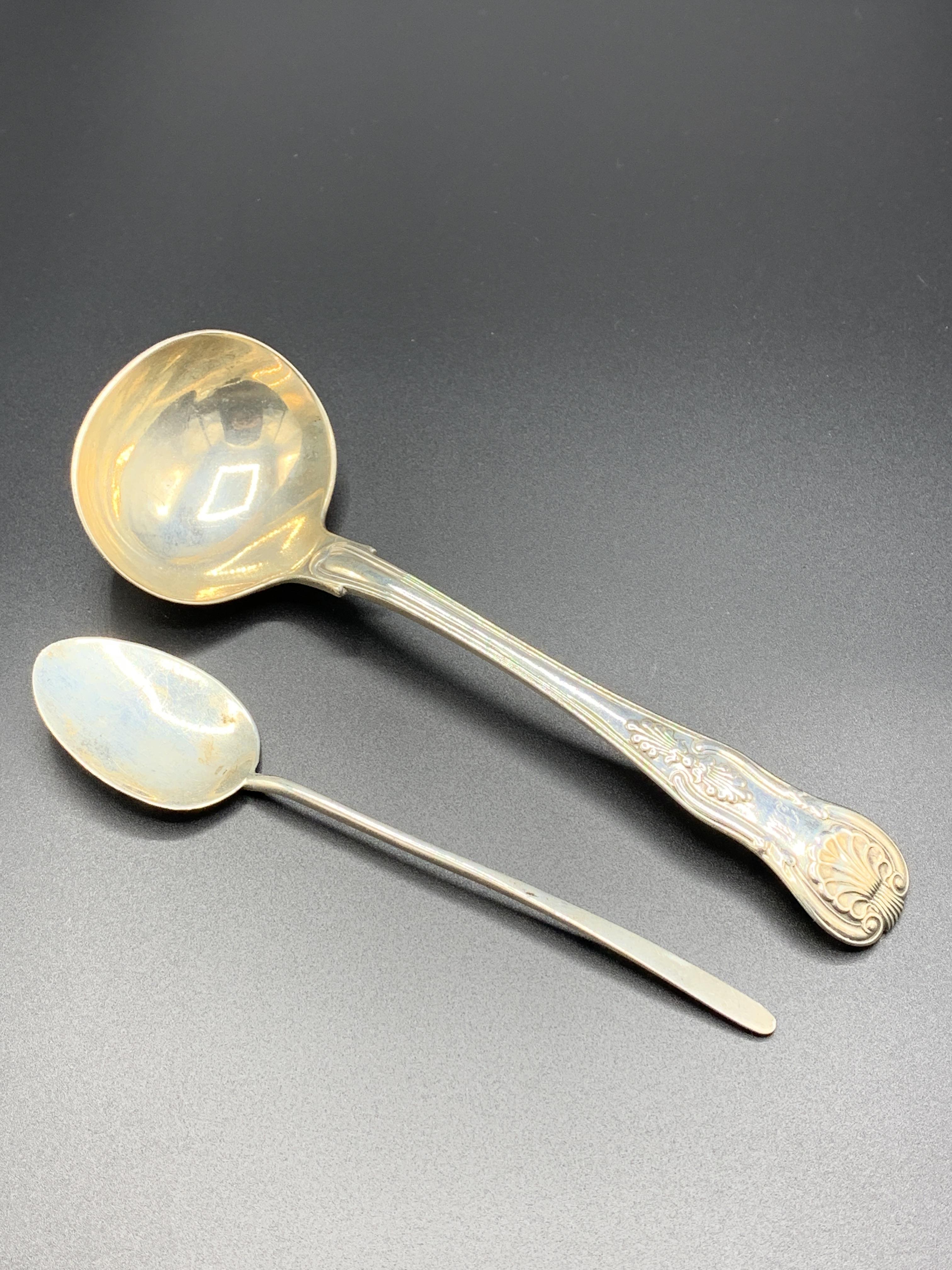 Irish silver ladle and a silver spoon by Walker & Hall