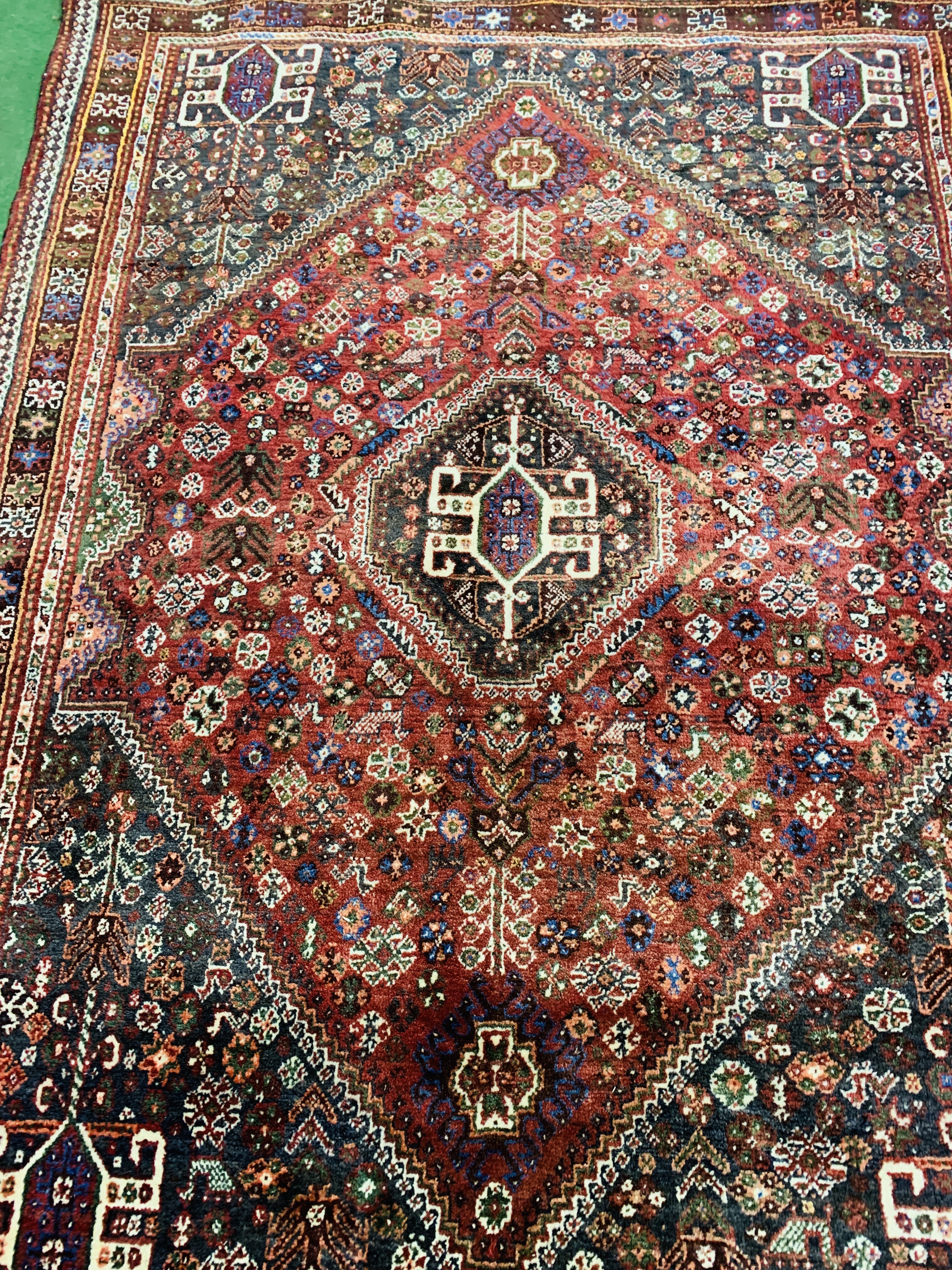 Dark red ground Qashqai Persian rug - Image 2 of 5