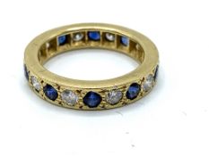 18ct yellow gold, diamond and sapphire full eternity ring