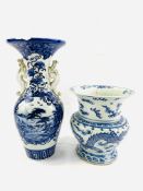 Two 19th century Oriental blue and white vases