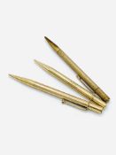 9ct gold rotating pencil fully hallmarked together with 2 other gold coloured pens