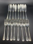 A set of eight silver fish knives and forks hallmarked Sheffield 1987 by Birmingham Mint