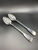 A pair of William IV Scottish fiddle pattern silver serving spoons