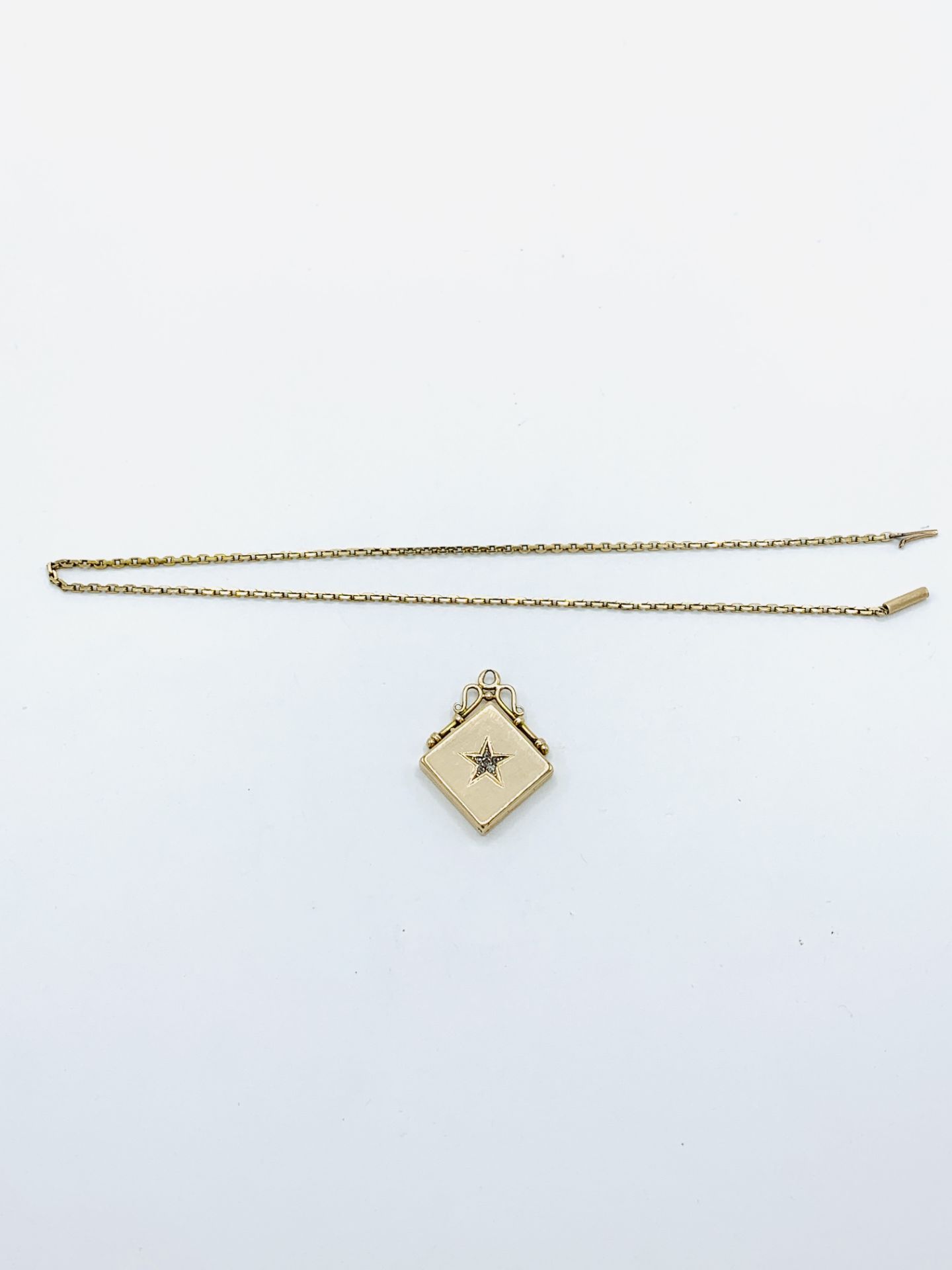 Late 19th century 14ct gold fob locket and chain
