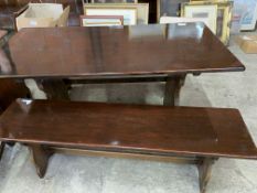Varnished wood table; together with two matching benches
