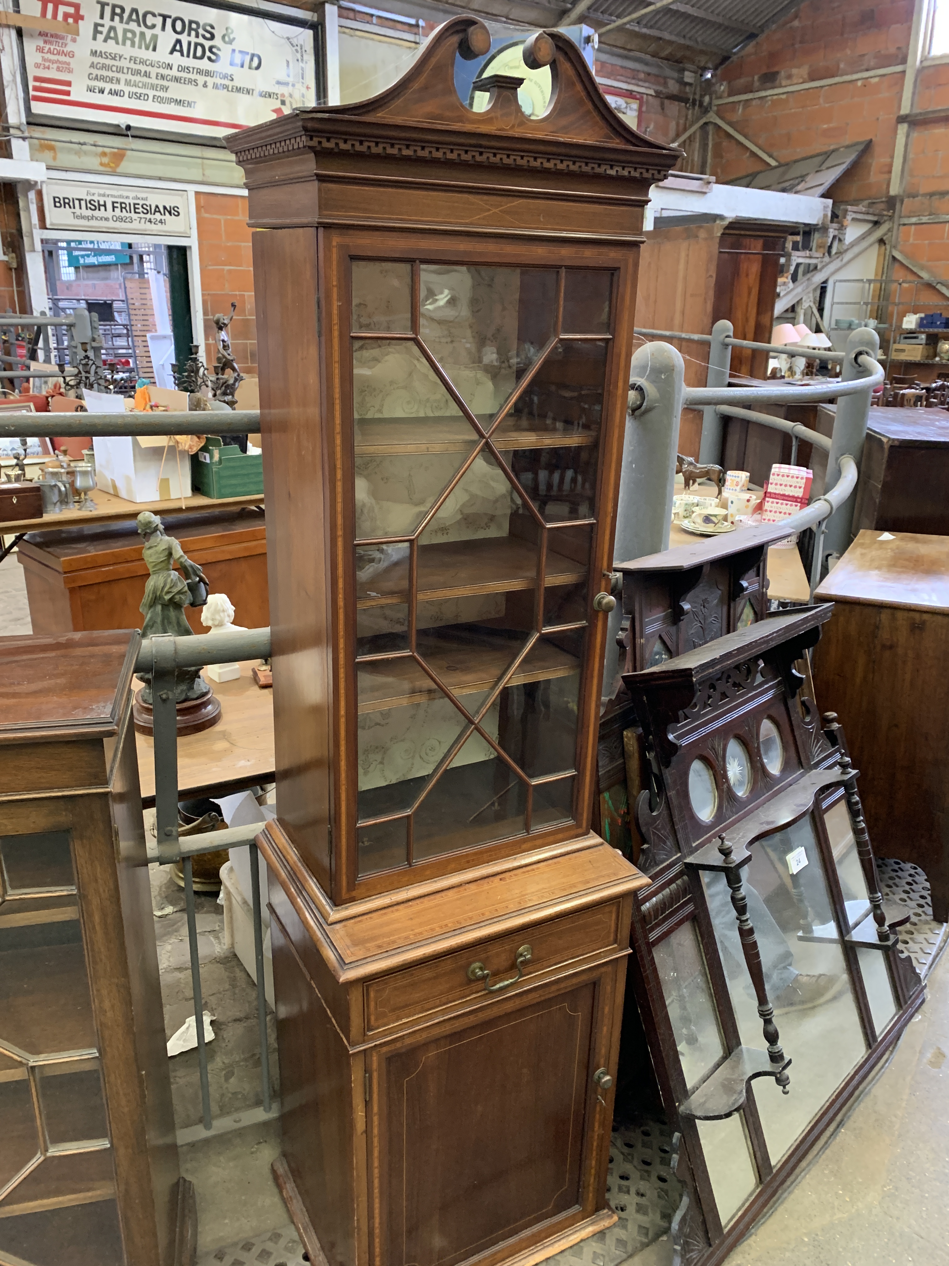 A mahogany glazed bookcase with adjustable shelves