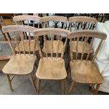 Six pine rail back chairs