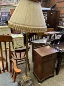 Brass columned lamp with black and white marble to base