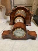 Three mantel clocks and a barometer