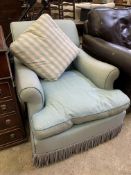 Pale blue upholstered arm chair