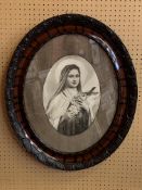 Carved decorative oval wood framed and glazed print