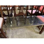 Gilt metal coffee table with smoked glass top
