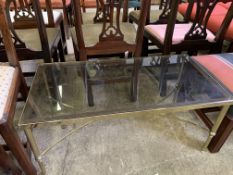 Gilt metal coffee table with smoked glass top