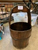 Coopered wooden bucket with metal banded handle