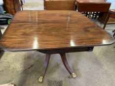 Edwardian mahogany swivel top drop side breakfast table