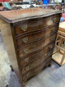 Mahogany serpentine fronted chest of six graduated drawers