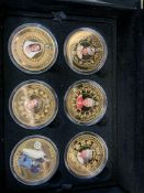 Collection of eighteen 24 carat gold plated crown coins in capsules