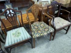 Two mahogany open elbow chairs, and a dining chair