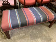 Mahogany long stool upholstered in striped fabric