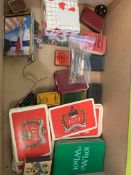 Box of assorted playing cards and games, including miniature cards