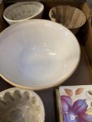 A stoneware mixing bowl, three stoneware jelly moulds and 6 decorative tiles.