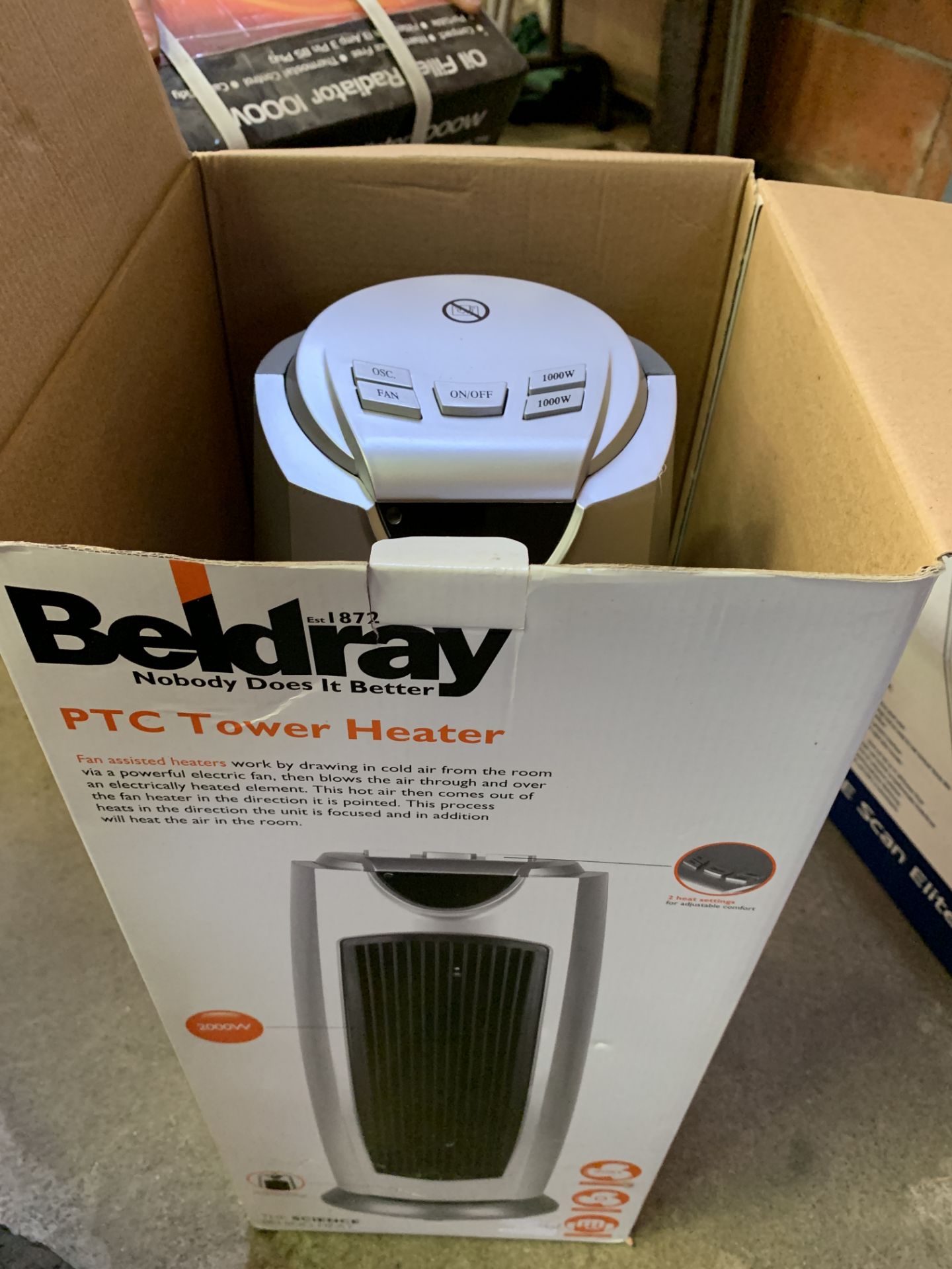 A Beldray tower heater in box, together with a boxed oil filled radiator