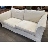 Cream upholstered large seat sofa