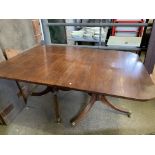 Mahogany extendable pedestal dining table