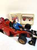 Hasbro international racing car; Nasa suited Action Man; limited edition Corgi fire vehicle