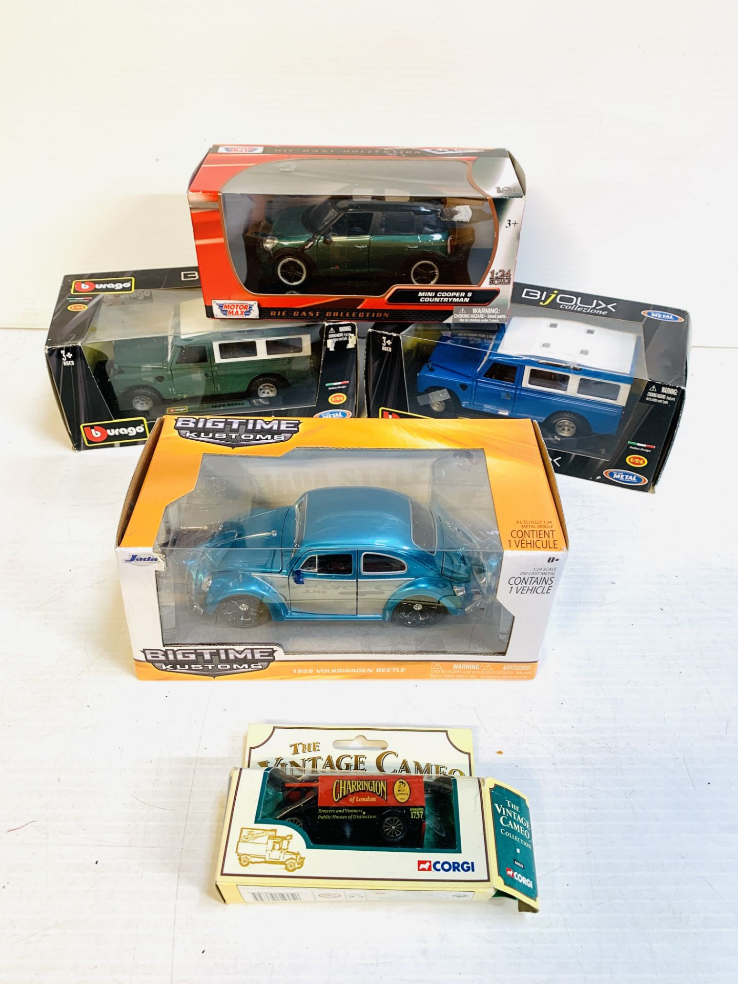 Two Burago diecast Land Rovers; a Big Time Kustoms diecast Volkswagen Beetle and others