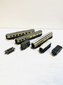 A collection of 00 gauge carriages and wagons, including Hornby and Dapol