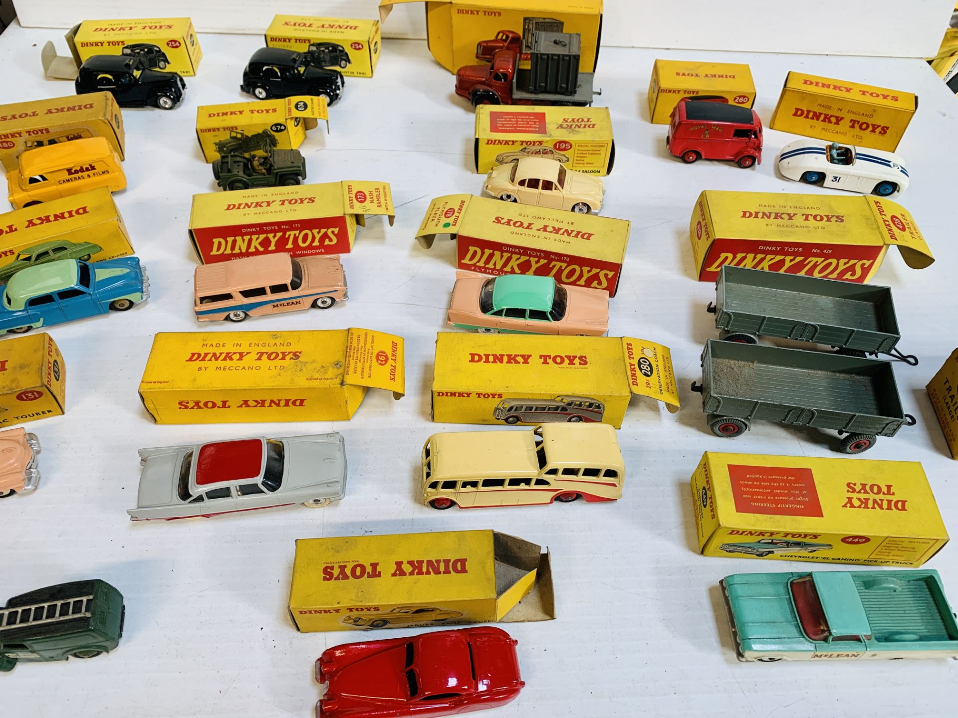 Collection of 17 boxed Dinky model vehicles; together with 2 boxed Dinky model trailers