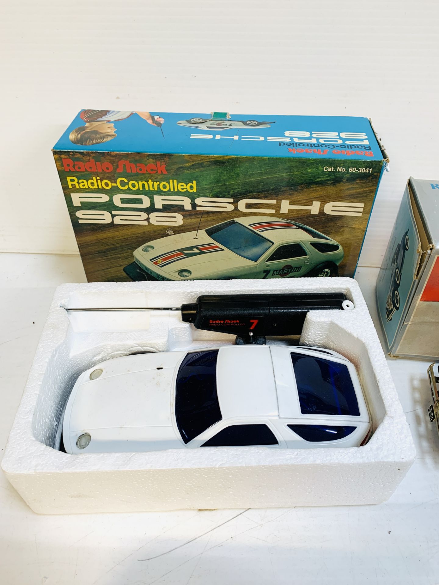 A Rolls Royce Phantom II transistor radio; a Radio-controlled model Porsche 928 with others - Image 6 of 6