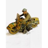 Tinplate clockwork military motorcyclist.